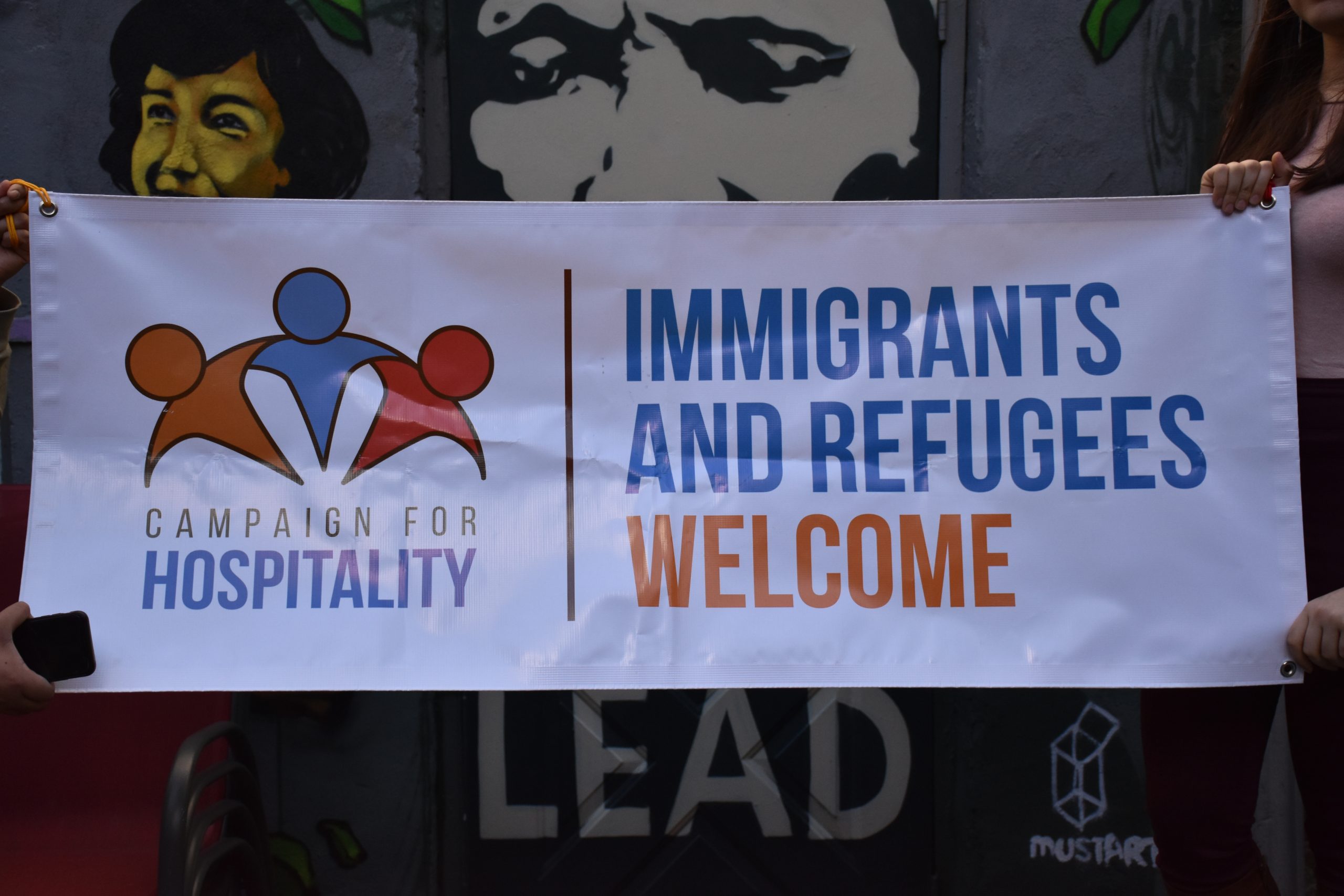 Back of the social justice house with Hospitality banner