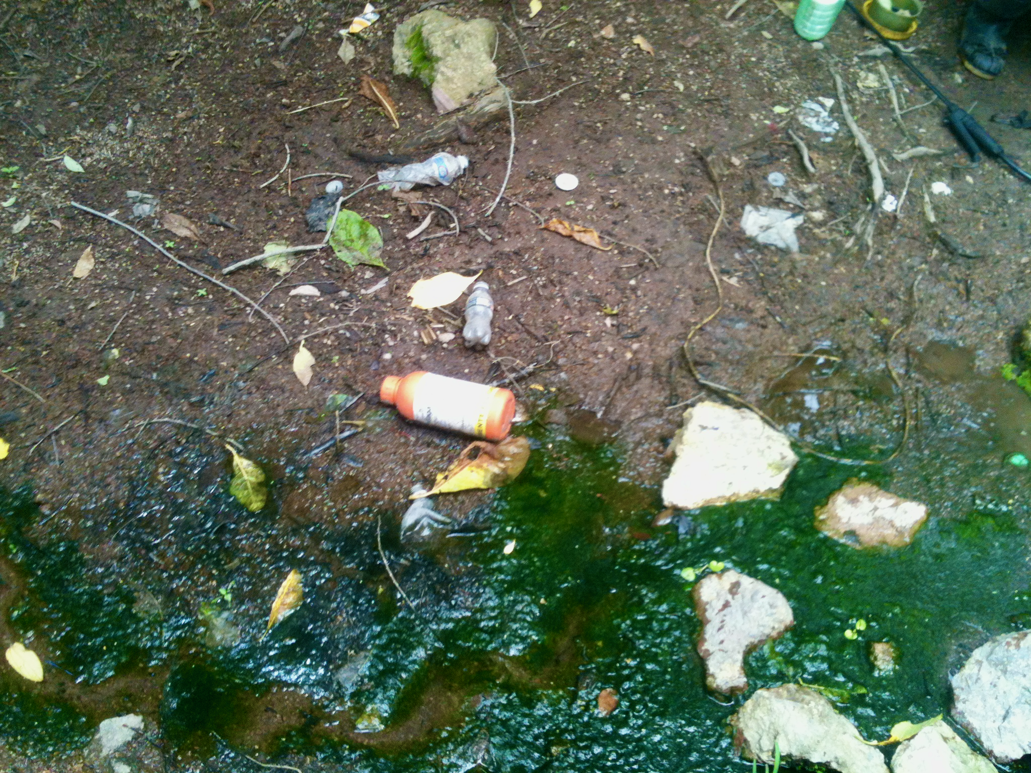 empty pesticide container near a stream Nicaragua